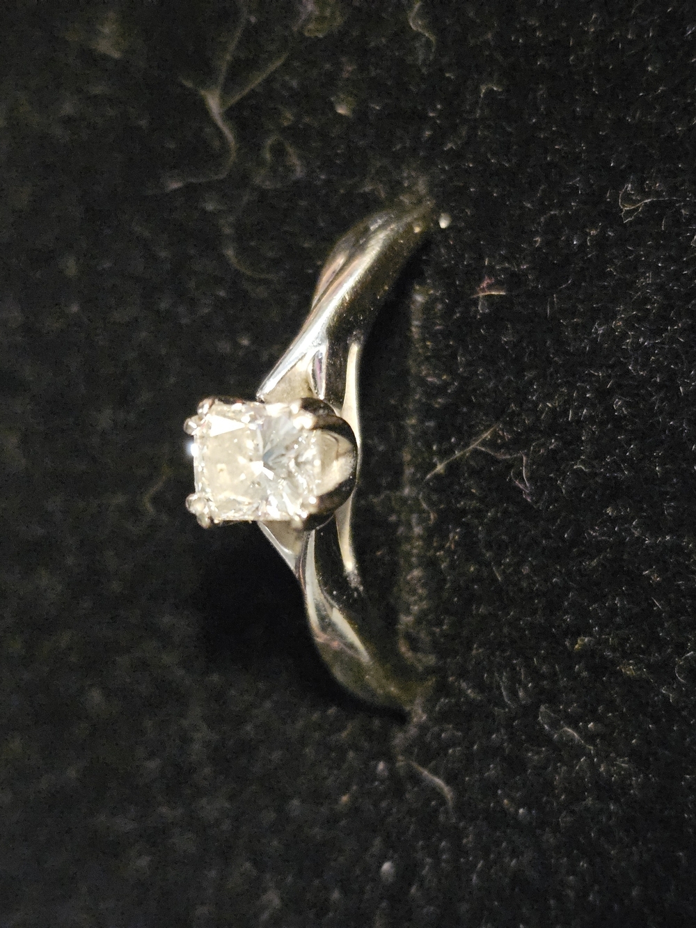 Sparkling Solitaire Emerald Cut Diamond In White Gold